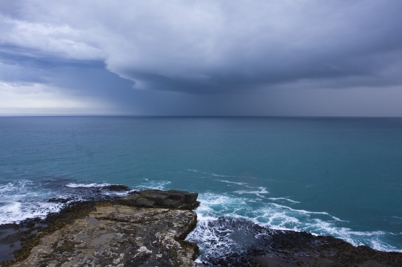 Surf And Storm Cloud